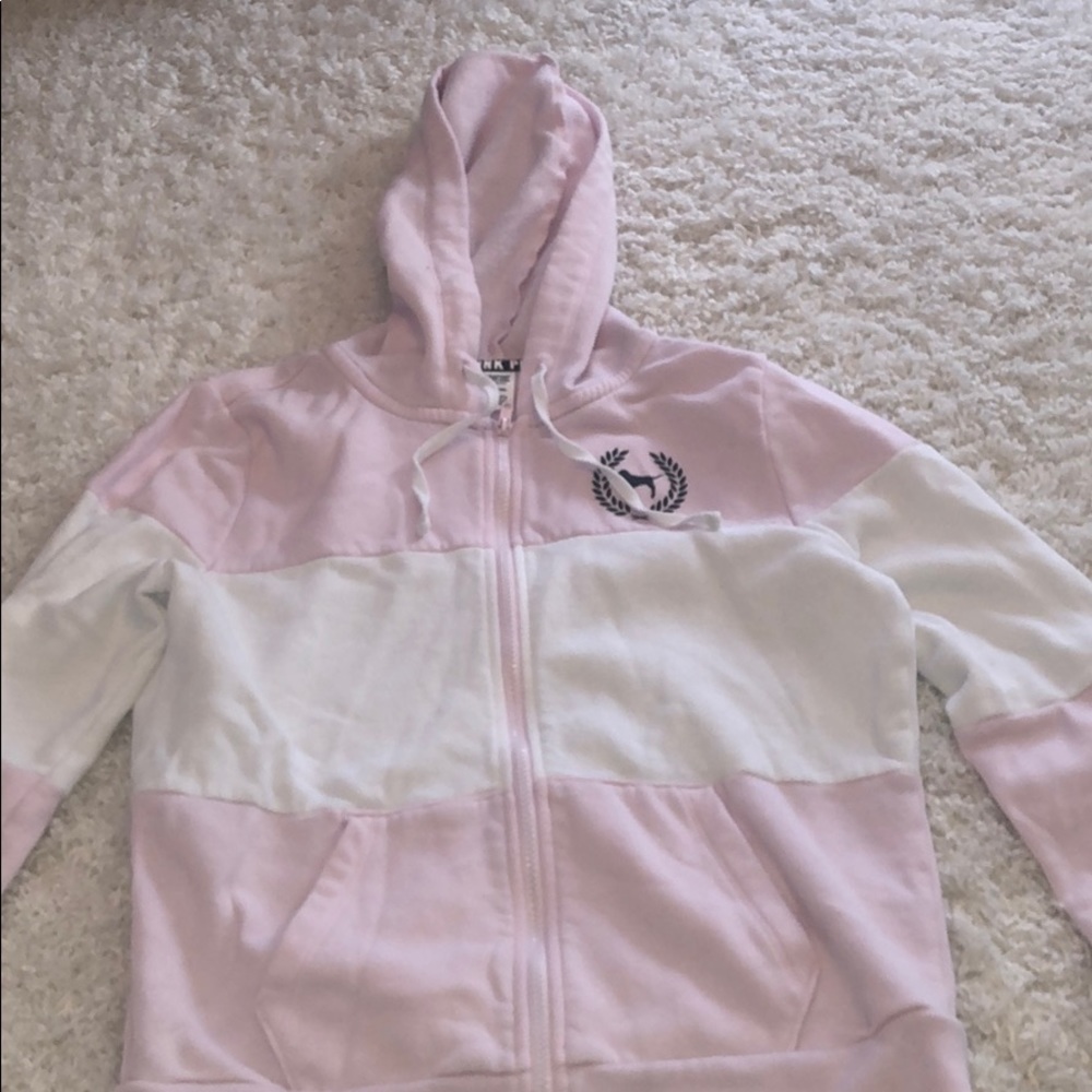 pink and white sweatshirt